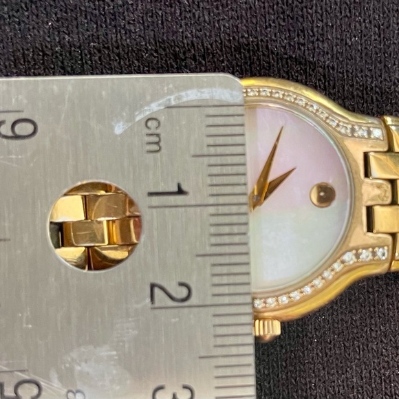 MOVADO gold plated. Mother of pearl and diamonds on each side. Sapphire crystal. - Picture 5 of 7